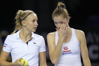 Jil Teichmann (à gauche) et Simona Waltert seront opposées vendredi à Iasi KEYSTONE/AP/KIN CHEUNG